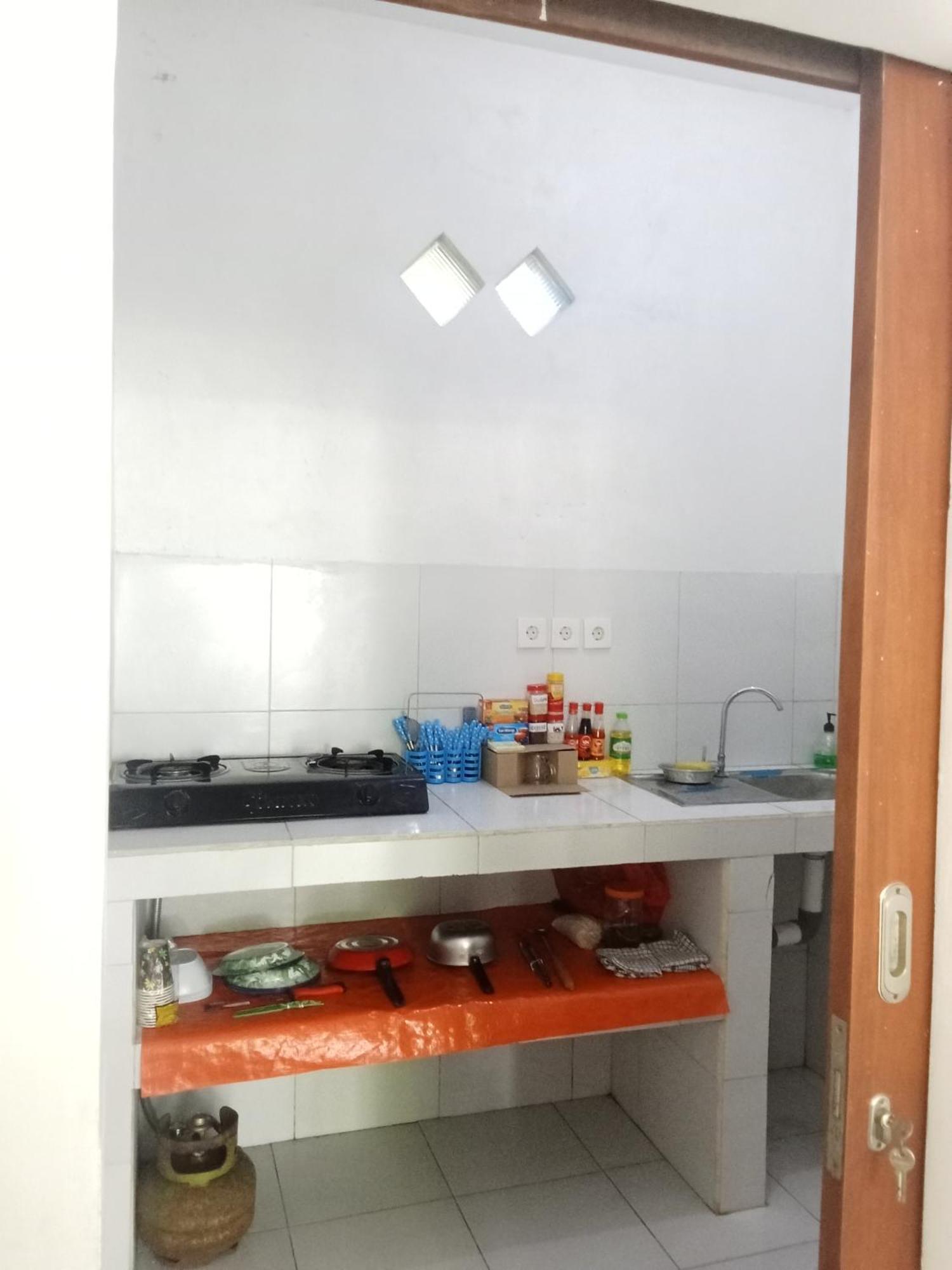 Komang Homestay Amed Cameră foto